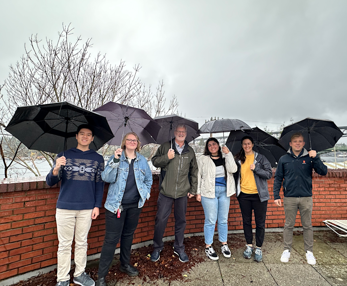 Lab Members with Umbrellas